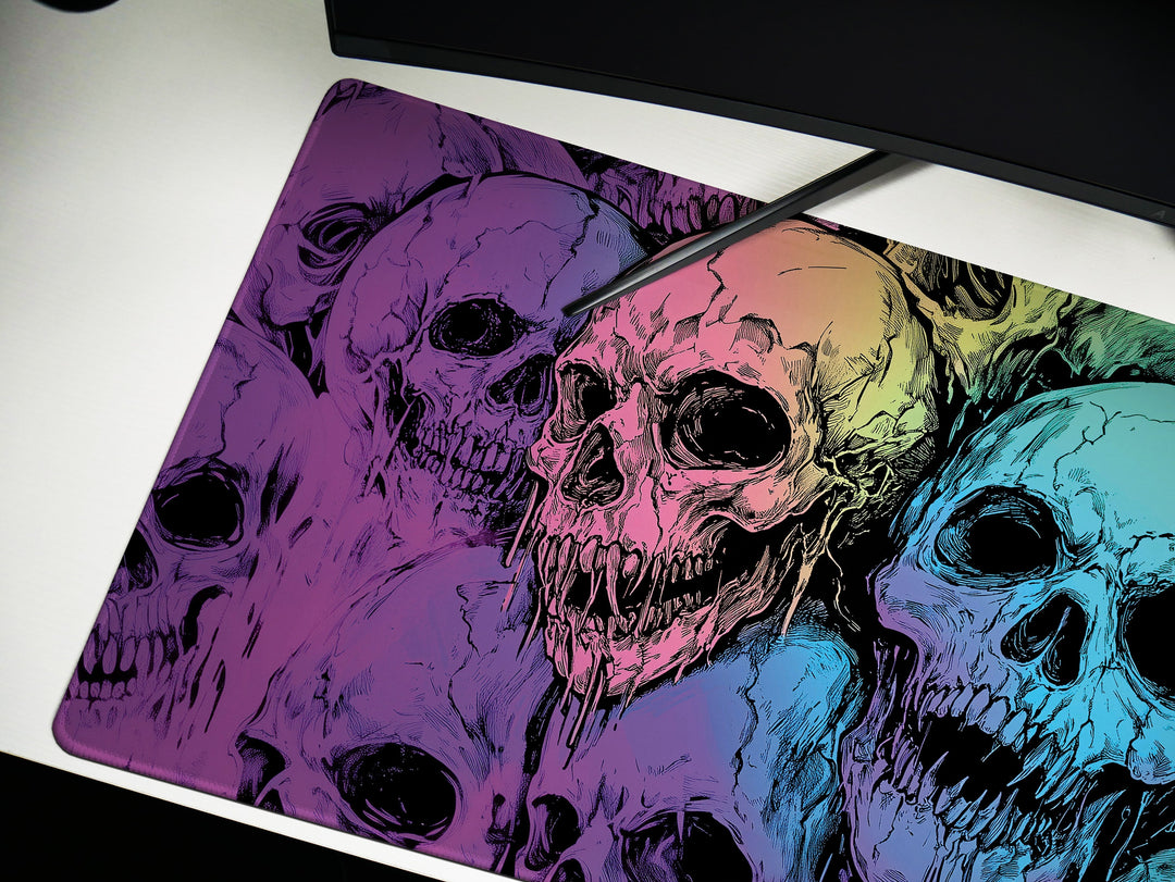 a computer mouse pad with a picture of skulls on it