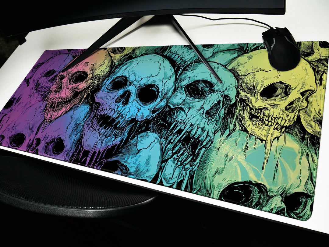 a computer mouse pad with a picture of skulls on it