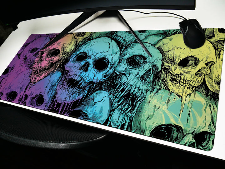 a computer mouse pad with a picture of skulls on it