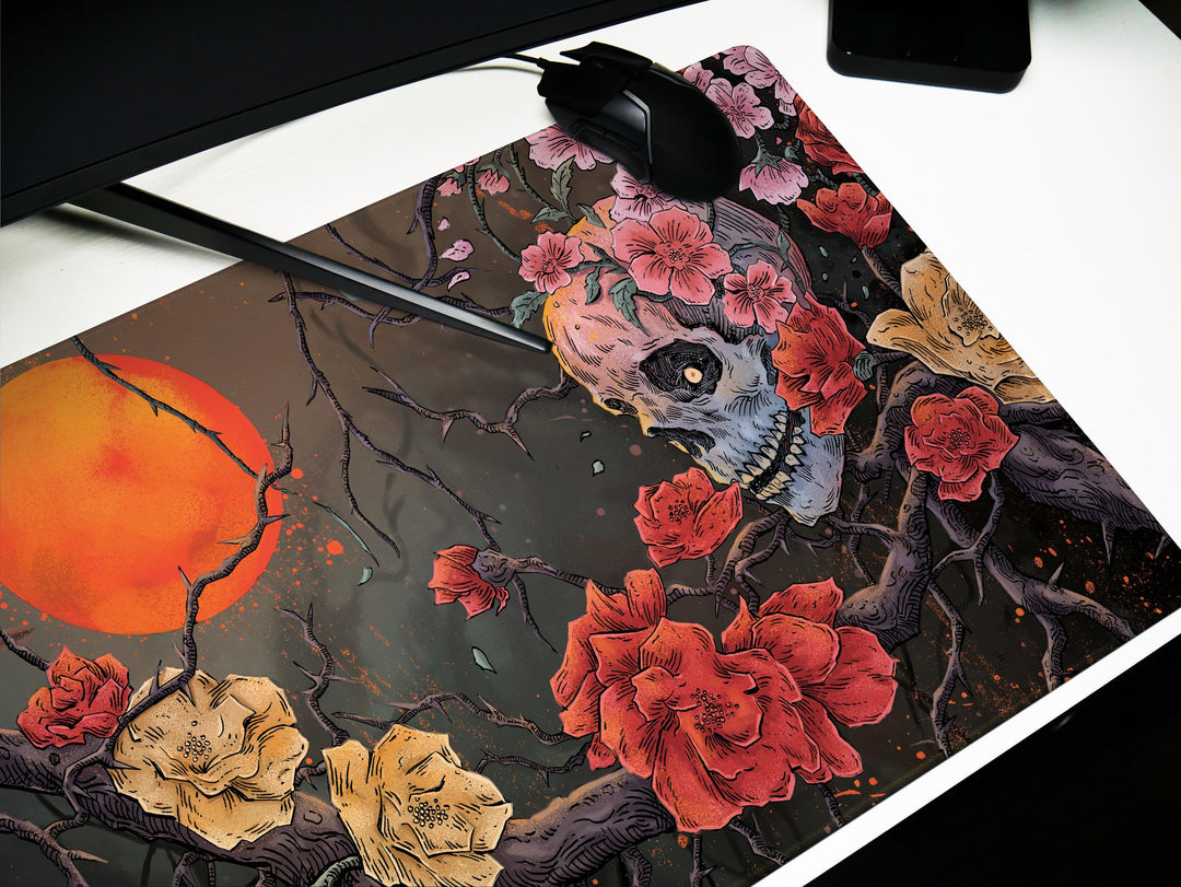 Bloom of Shadows, Desk Pad, Mouse Pad, Desk Mat, Floral Skull Art, Surreal Sunset, Nature and Decay Fusion, Artistic Office Decor